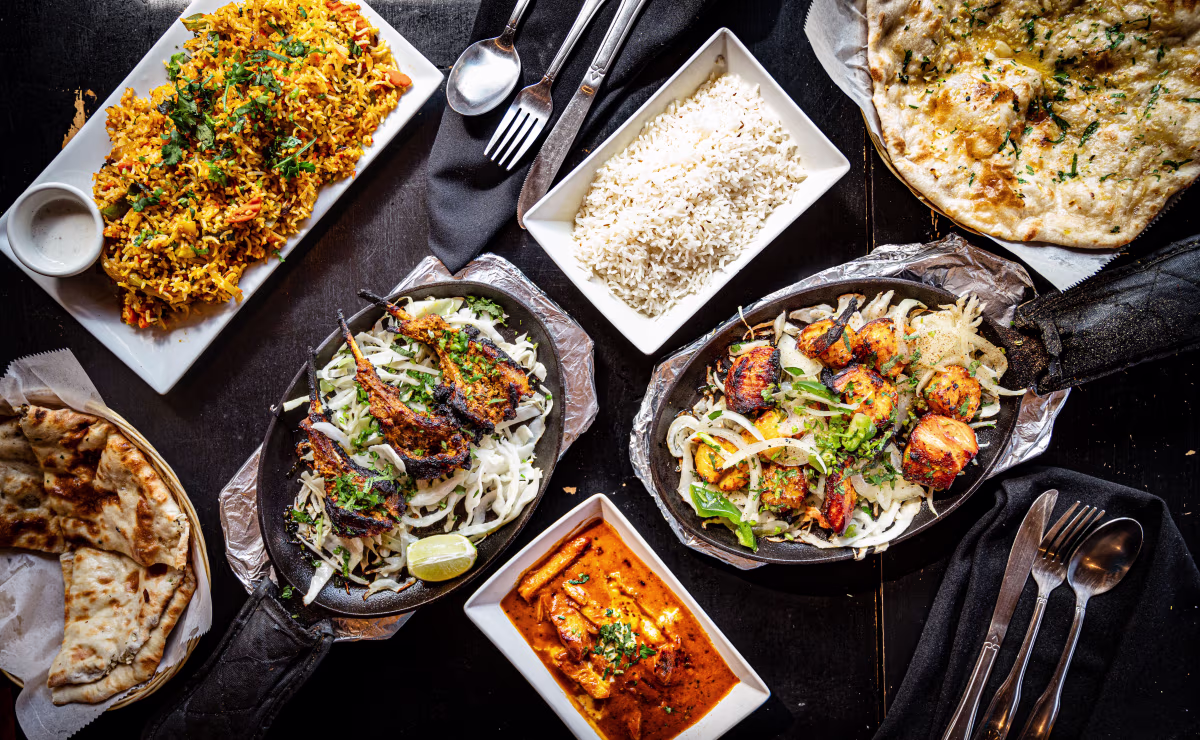 Indian Char House signature dishes Smoked Malai ChickenLamb Seekh KebabChar House Biryani